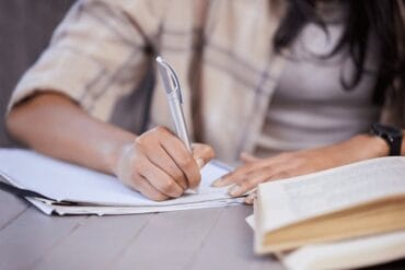 UGC NET student planning a 90-day study schedule with notes, calendar, and books